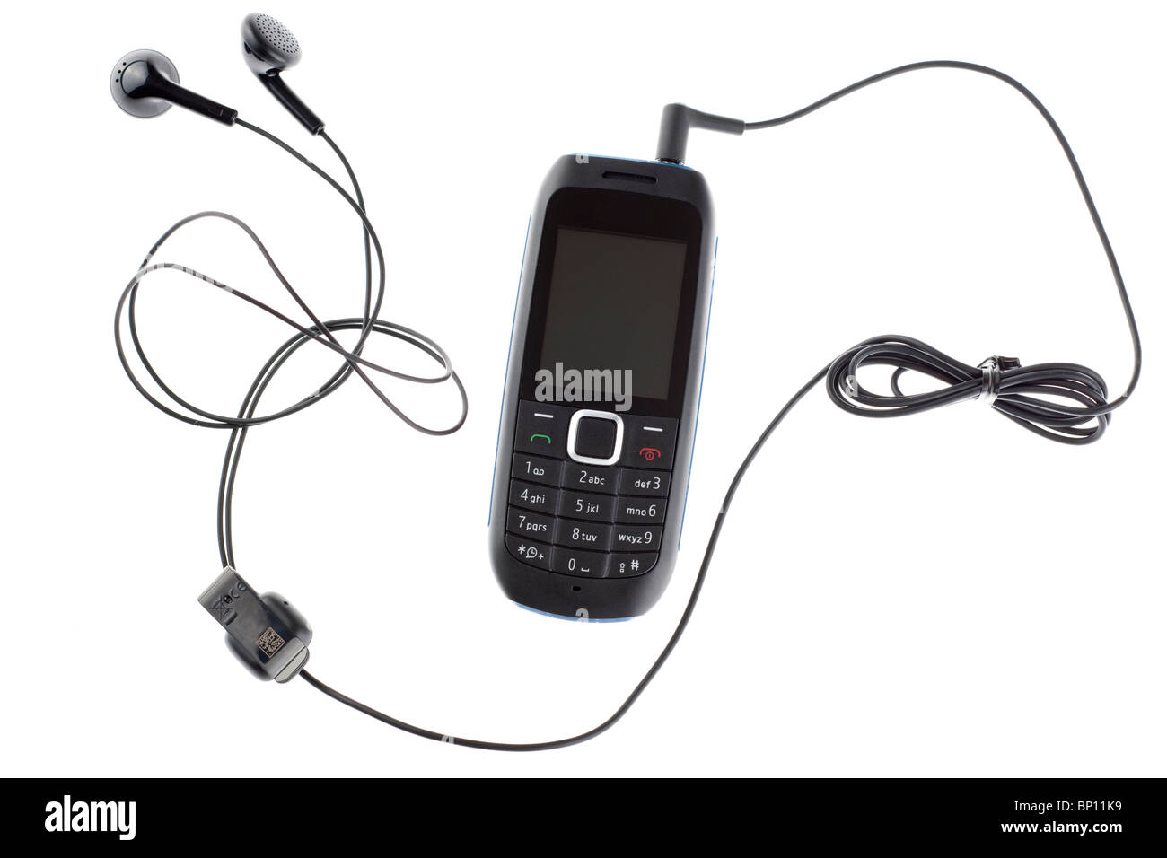 Mobile phone with attached audio cable and earphones Stock Photo Alamy