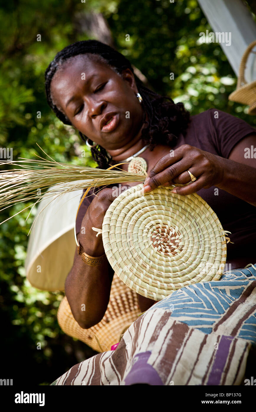 Barbara Manigault, a Gullah sweet grass basket weaver at her stand in ...