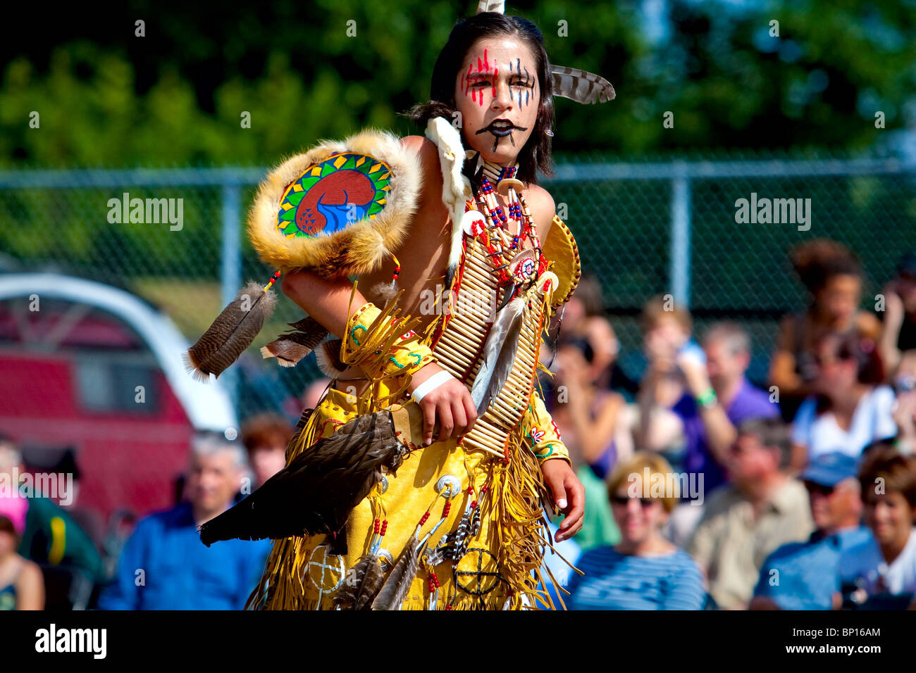 A young natives wearing Huron-Wendat traditional dresses and paint takes  part into the dance contest of the Wendake Pow-Wow Stock Photo - Alamy