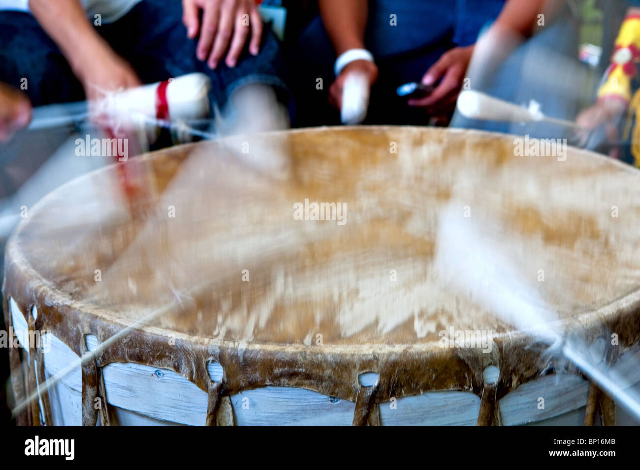 Drummers hits a drum during the traditional dance contest of the Wendake Pow-Wow Stock Photo