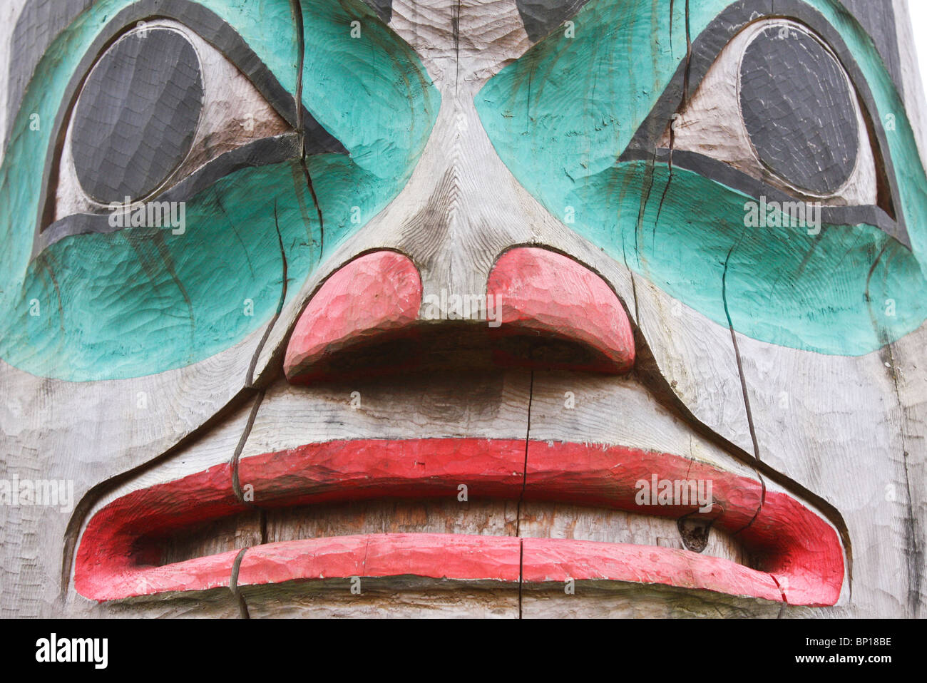 A fearsome-looking totem, Tlingit village of Klawock, Inside Passage, Alaska, USA. Stock Photo