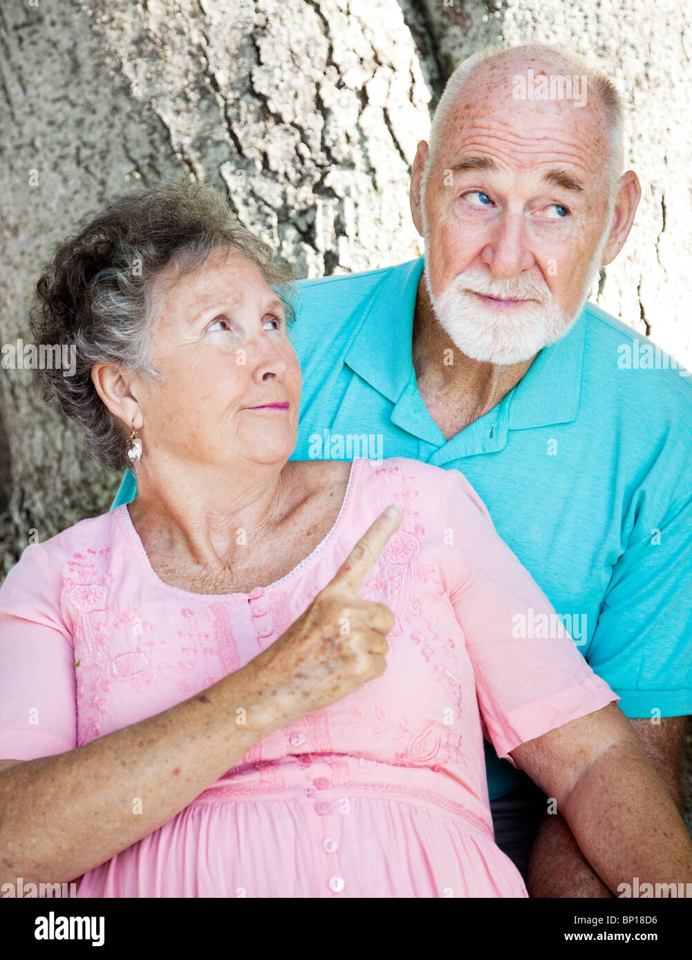 Senior woman angry with her mischievous husband Stock Photo - Alamy