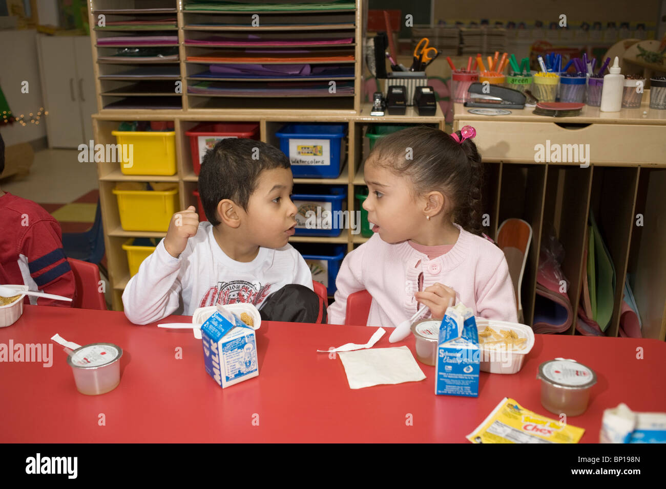 kindergarten students talking to each other