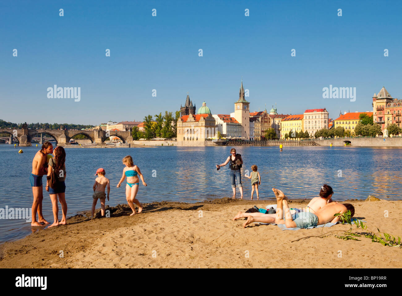 prague people enjoying summer strelecky island beach old town in