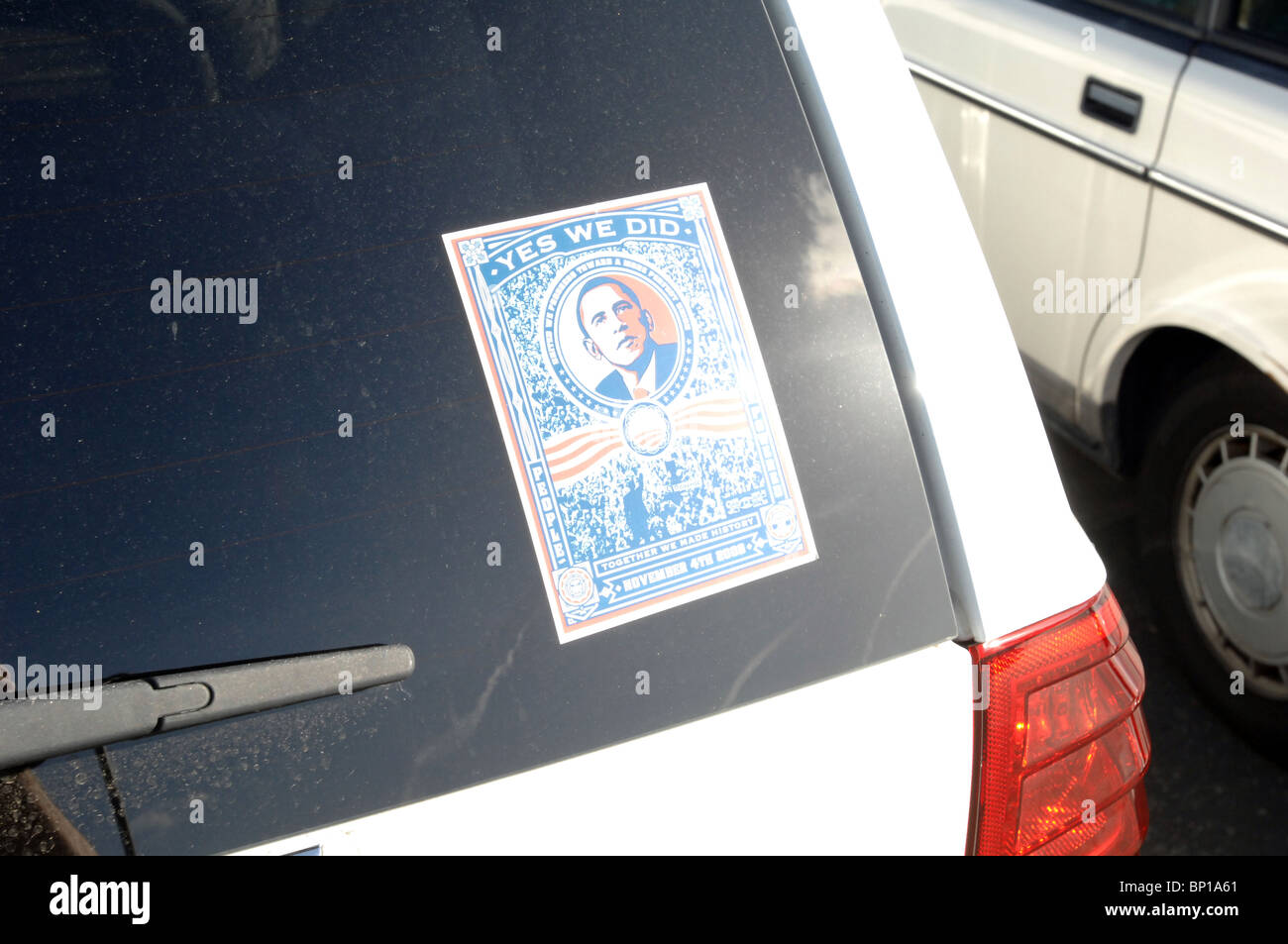 'Yes We Did' bumper sticker on the rear window of an American Made SUV. Stock Photo