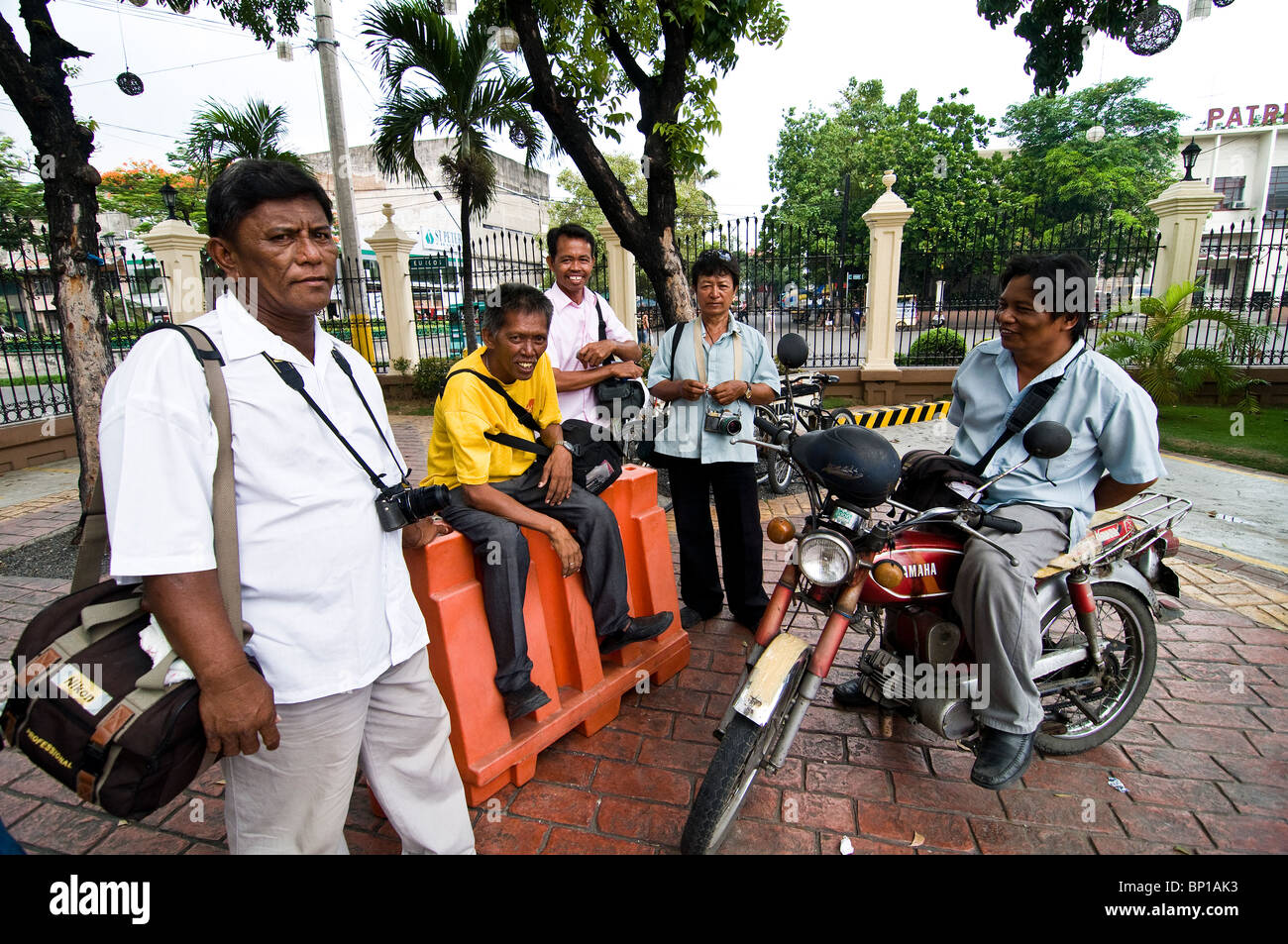A group of local photographers who still use very old film cameras. Stock Photo