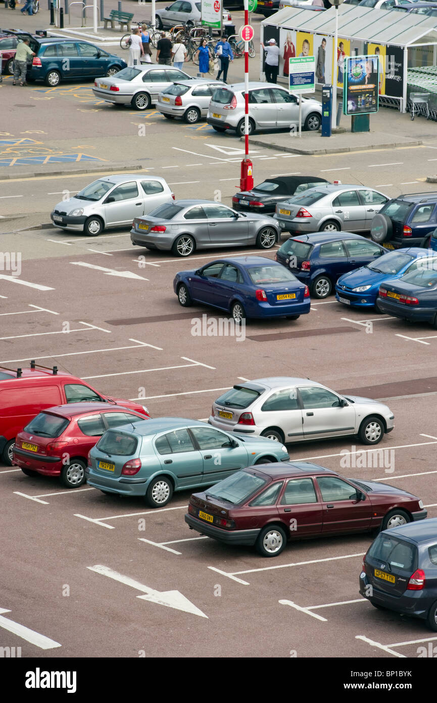 Aerial view of stationary parked cars at a public car park in Brighton Sussex UK Stock Photo