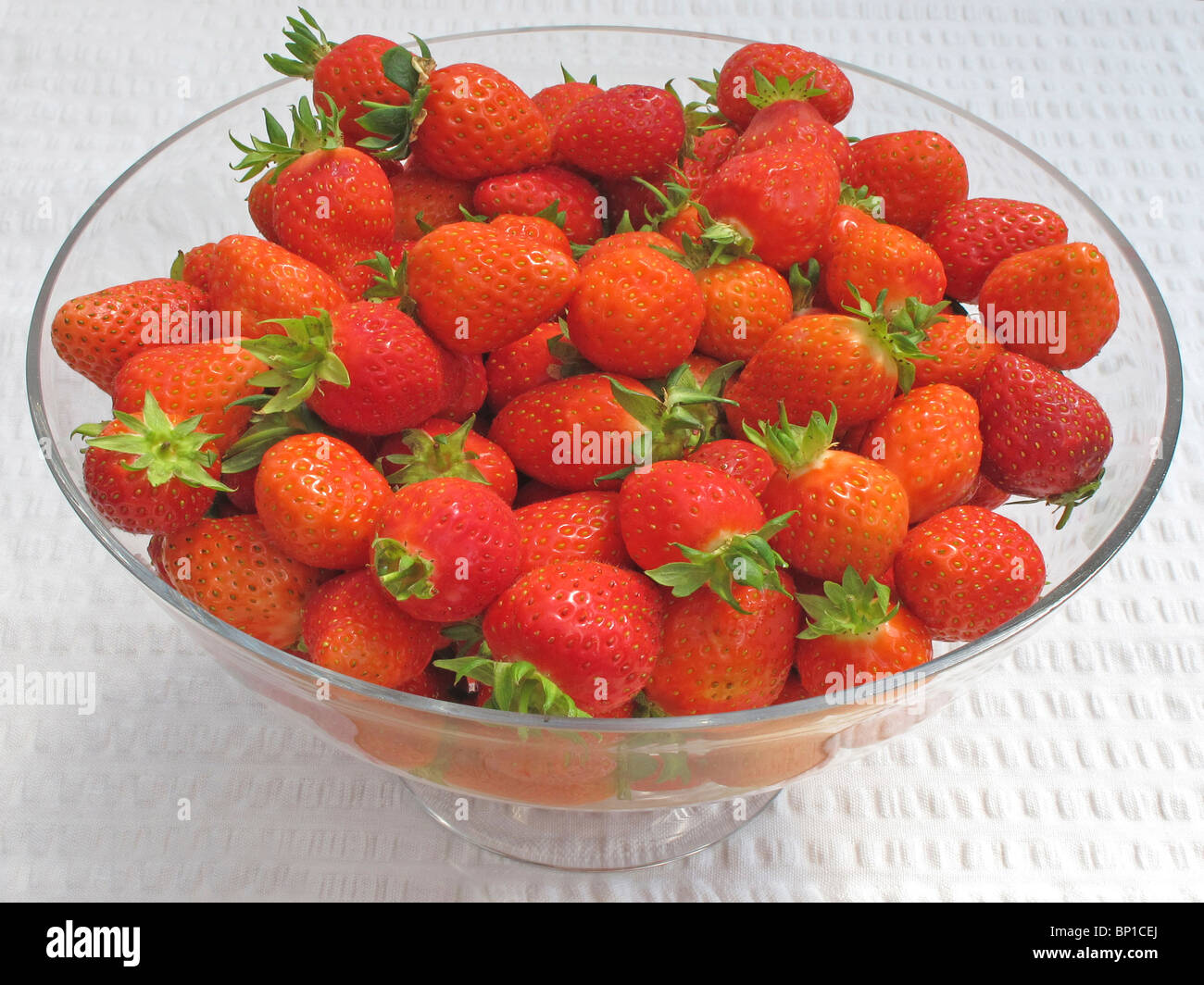 Strawberries in a Glass Bowl Stock Photo - Alamy