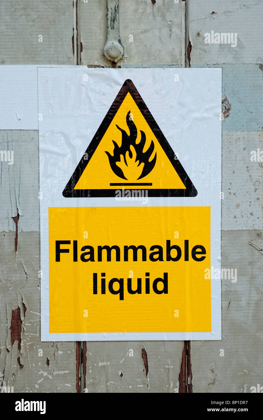 Flammable liquid adhesive sign yellow Stock Photo