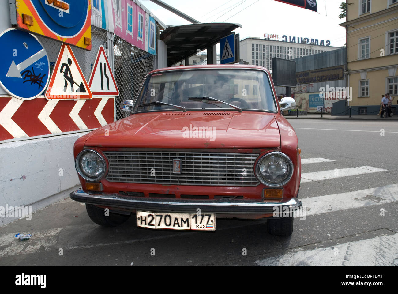 An old red Lada on a Moscow street, Russia Stock Photo