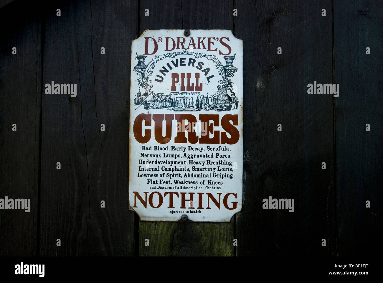 Cures Sign In enamel sign for Dr drakes universal pill cures everything Stock Photo ...