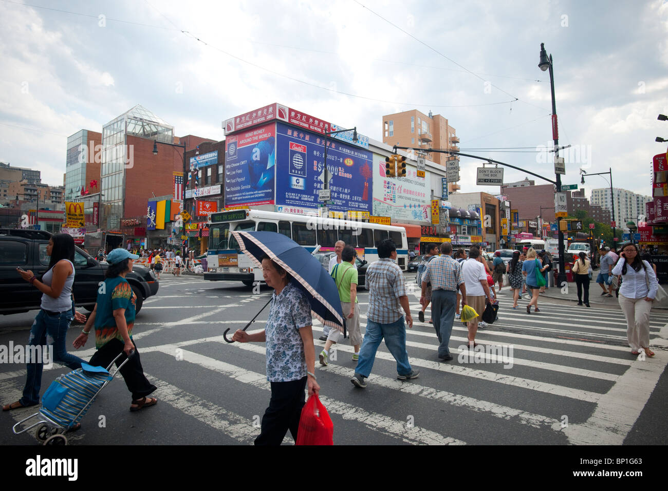 The busy intersection of Main Street and Roosevelt Avenue in the