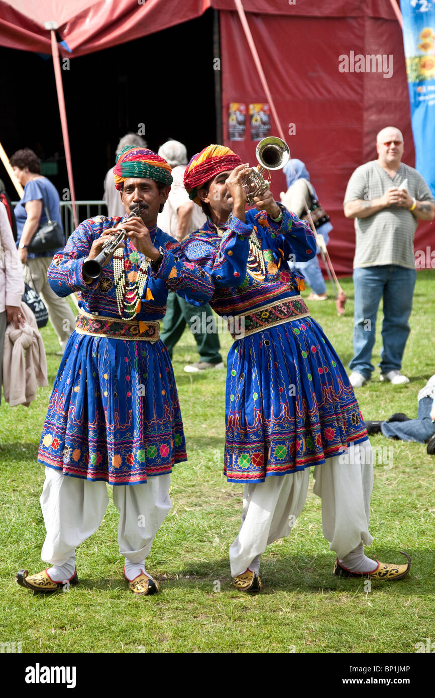 trumpeter and clarinetist from the Jaipur Kawa Brass Band performing outdoors at the 2010 Edinburgh Mela at Leith Links Scotland Stock Photo