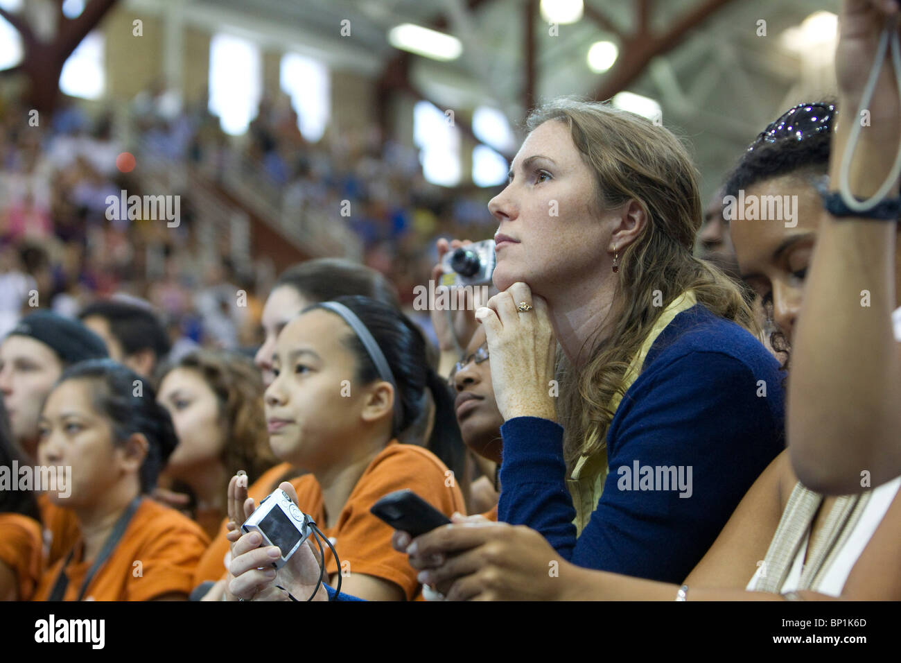 College students listen to U.S. President Barack Obama during speech on the University of Texas campus in Austin. Stock Photo