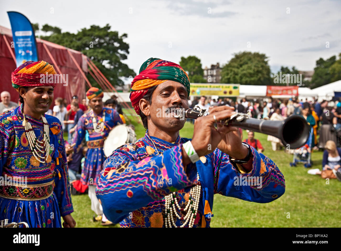Two members of Jaipur Kawa Brass Band performing outdoors at the Edinburgh Mela 2010 at Leith Links, clarinetist playing. Stock Photo