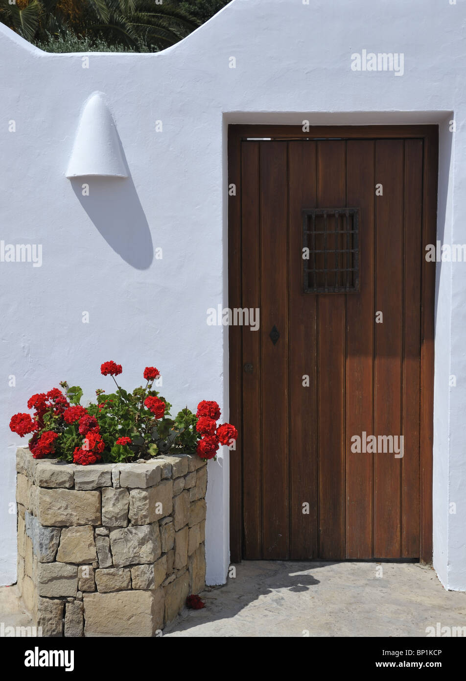 Doorway with geraniums, Moraira Stock Photo