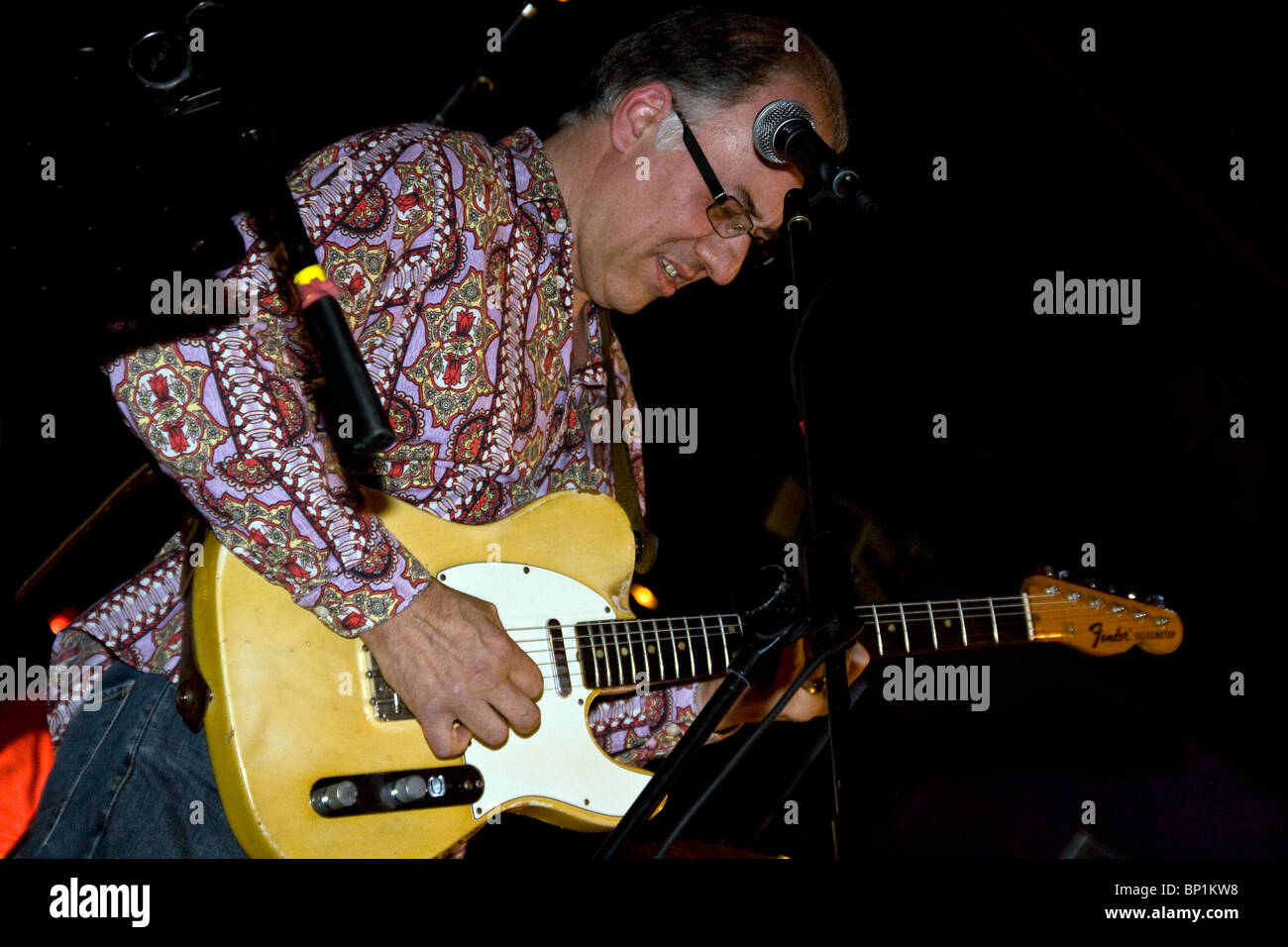 Wang Dang Delta Blues Band guitarist playing a solo riff during their performance at Deja Vu`s nightclub in Dundee,UK Stock Photo