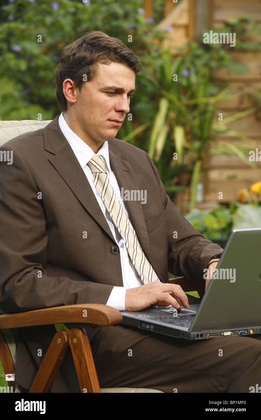 Young man with a laptop Stock Photo