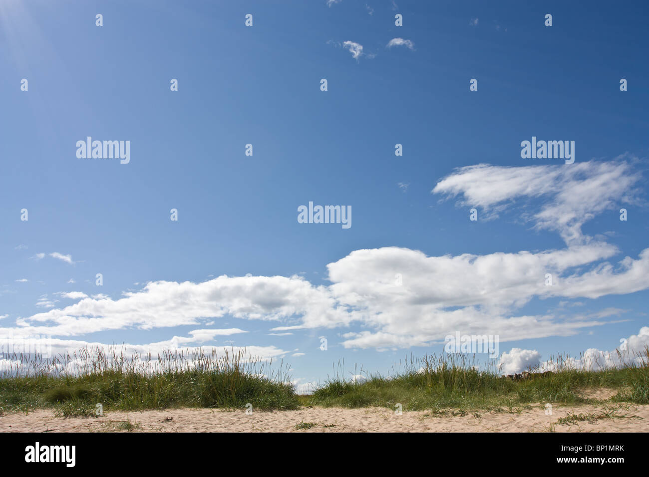 Sky background of vivid blue sky and white fluffy clouds Stock Photo ...