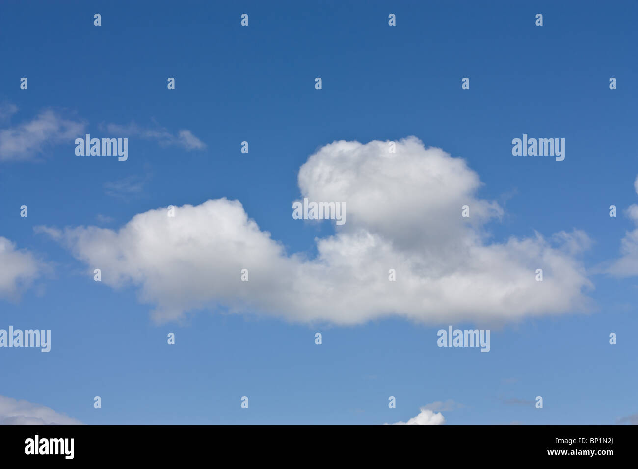 Sky background of vivid blue sky and white fluffy clouds Stock Photo ...
