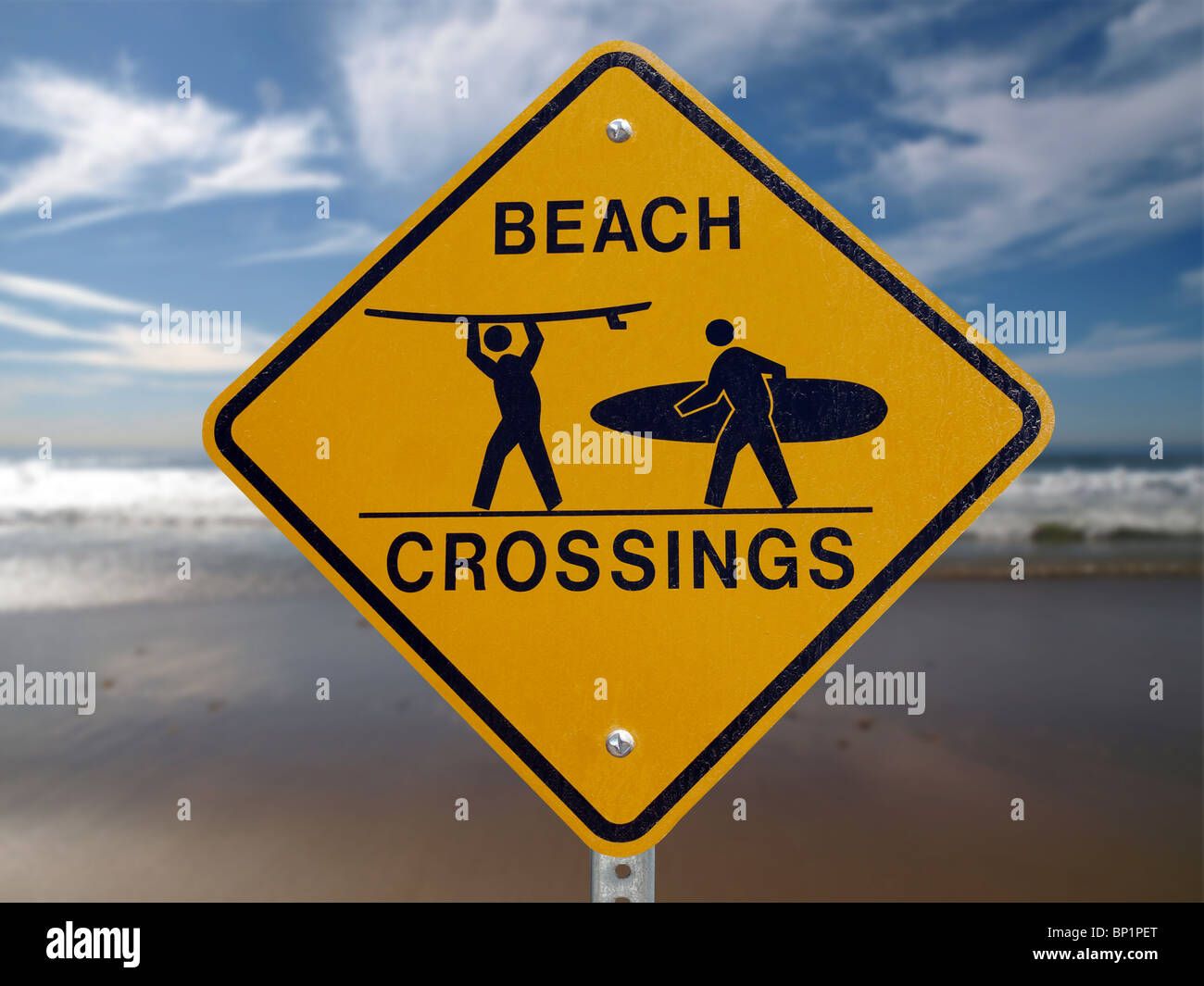 Beach Crossings crosswalk sign with a Malibu beach background. Stock Photo