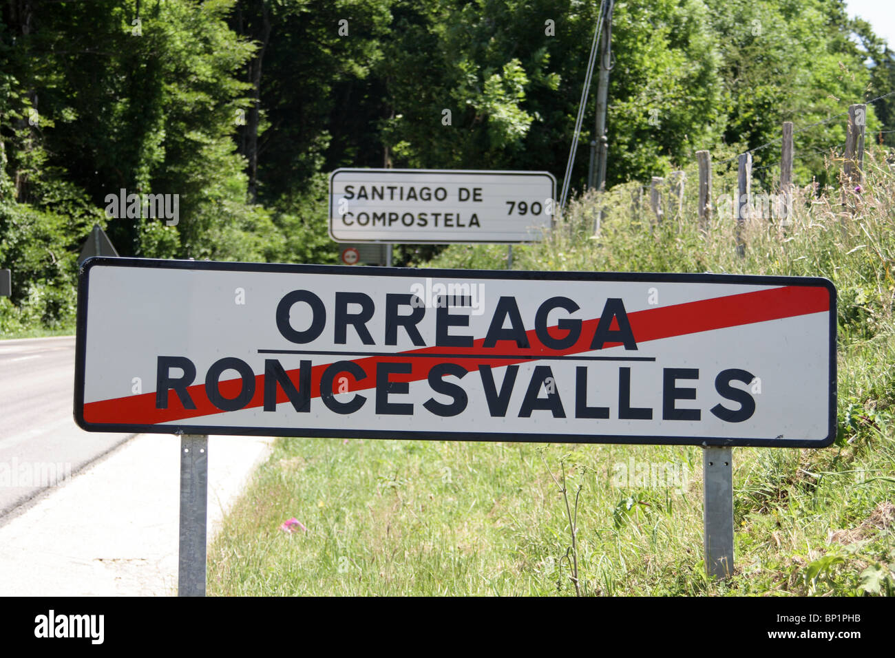 Roadsign on outskirts of Roncesvalles, start of the Camino de Santiago, with distance to Santiago de Compostella marked (790KM) Stock Photo