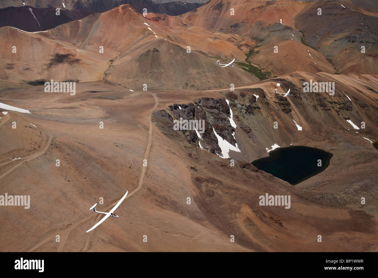 Gliders Racing in FAI World Sailplane Grand Prix, Andes Mountains, Chile, South America - aerial Stock Photo