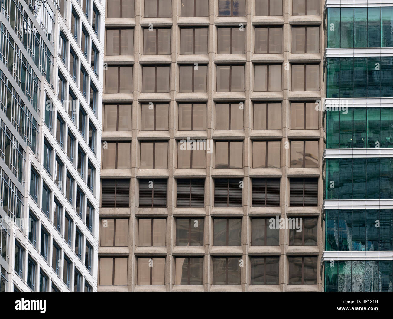 A close-up detail of three high-rise buildings in Vancouver's downtown core. Stock Photo