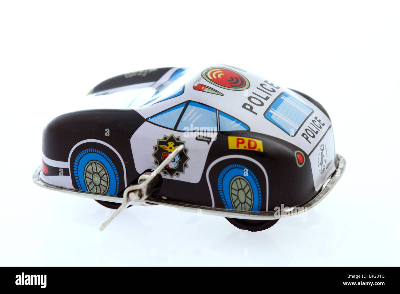 Tin Toy, police patrol car, wind up key to activate the mechanical