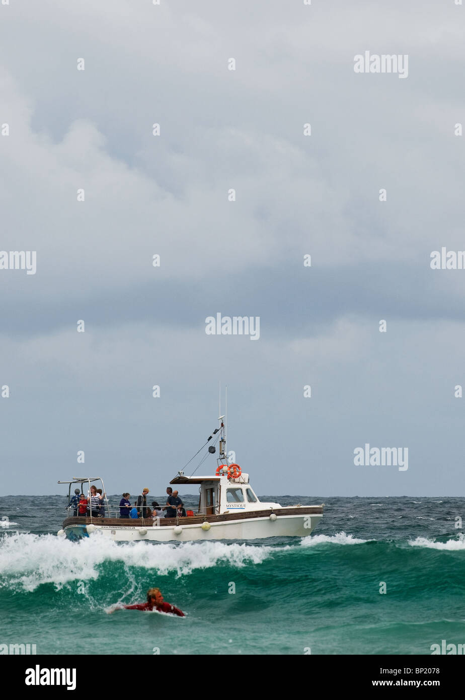 A boat on the sea off the coast of Newquay. Photo by Gordon Scammell Stock Photo