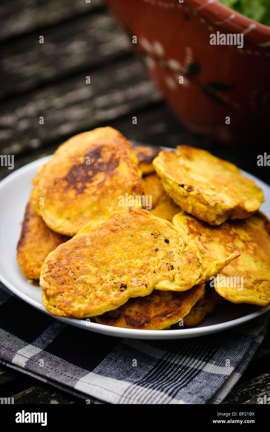 Gluten free fritters made with gram flour batter and prawns Stock Photo