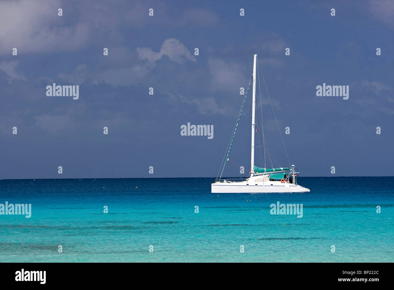 Catamaran anchors in Lagoon, Rangiroa, French Polynesia Stock Photo