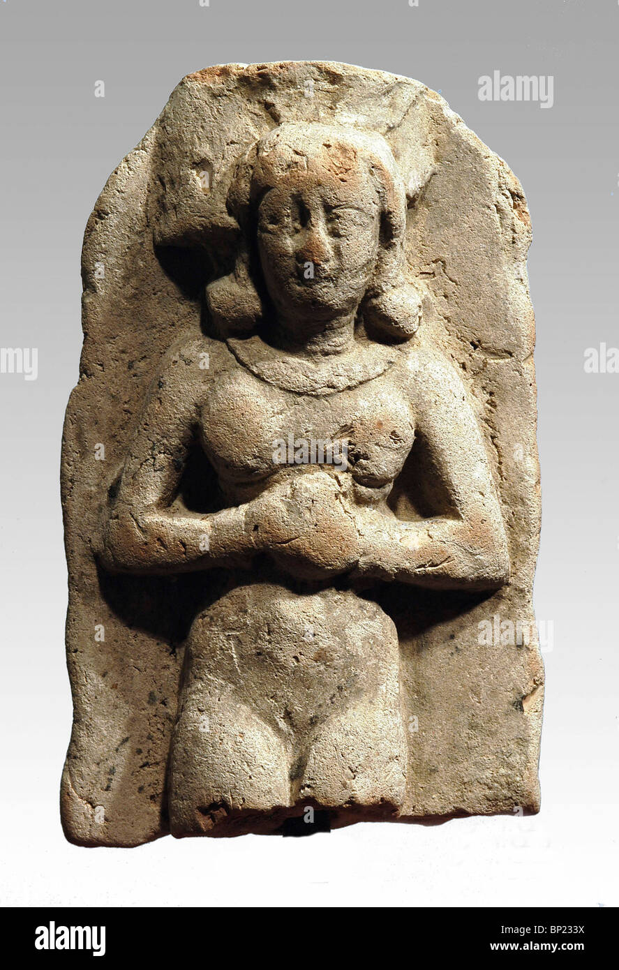 ASHERAH (ASHTORETH) - CNAANITE GODDESS OF FERTILITY, THE CONSORT OF THE PRINCIPAL GOD EL OR BIBLICAL BAAL.  THE CLAY FIGURINES D Stock Photo