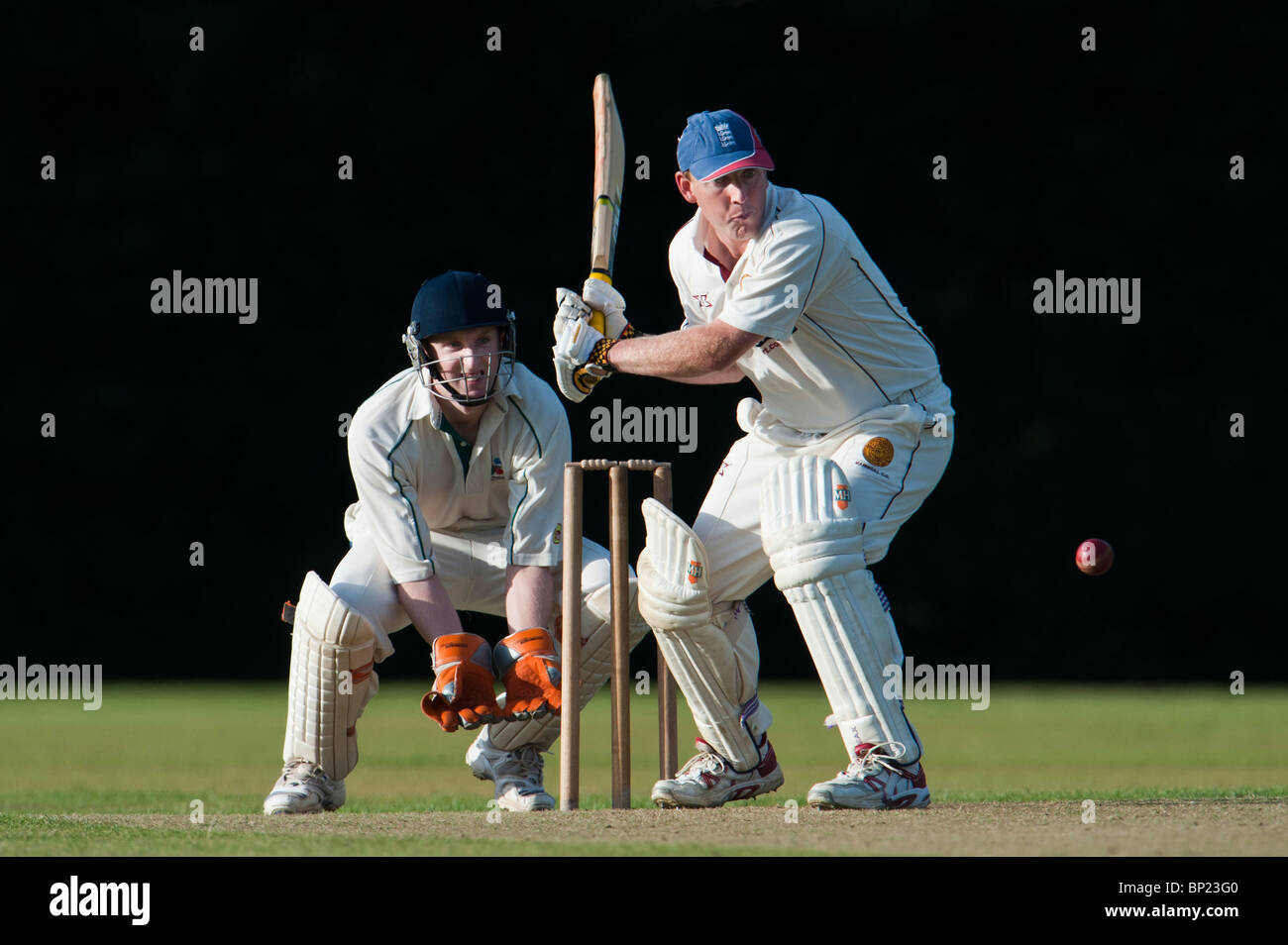 Cricket batsman in action Stock Photo Alamy