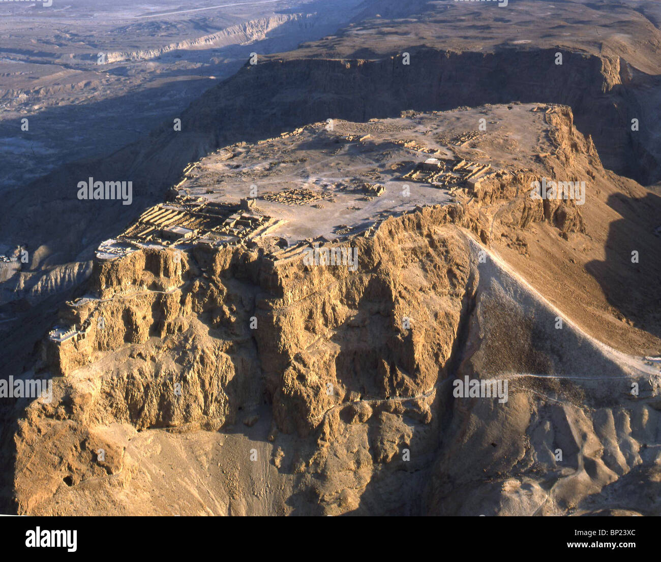MASSADA - LOCATED IN THE RUGGED EASTERN DESERT OF JUDEA,  NEAR THE DEAD SEA. KING HEROD FORTIFIED IT AND BUILT ON IT  HIS PALAC Stock Photo