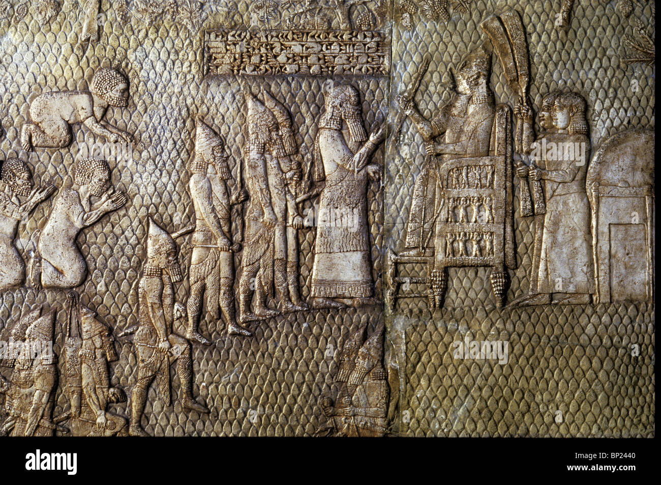 KING SANNACHERIB ON HIS THRONE RECEIVING HIS GENERALS AFTER THE BATTLE OF LACHISH. SCENE FROM A RELIEF IN SANNACHERIB'S PALACE Stock Photo