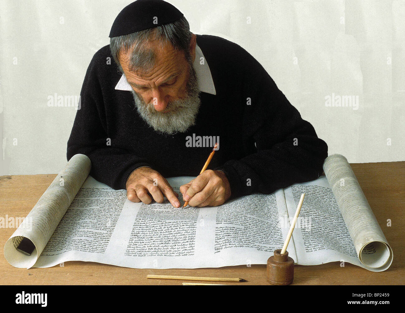 405. THE TORAH SCROLL IS BEING WRITTEN BY HAND, ON PARCHMENT BY A PROFFESIONAL SCRIBE Stock Photo