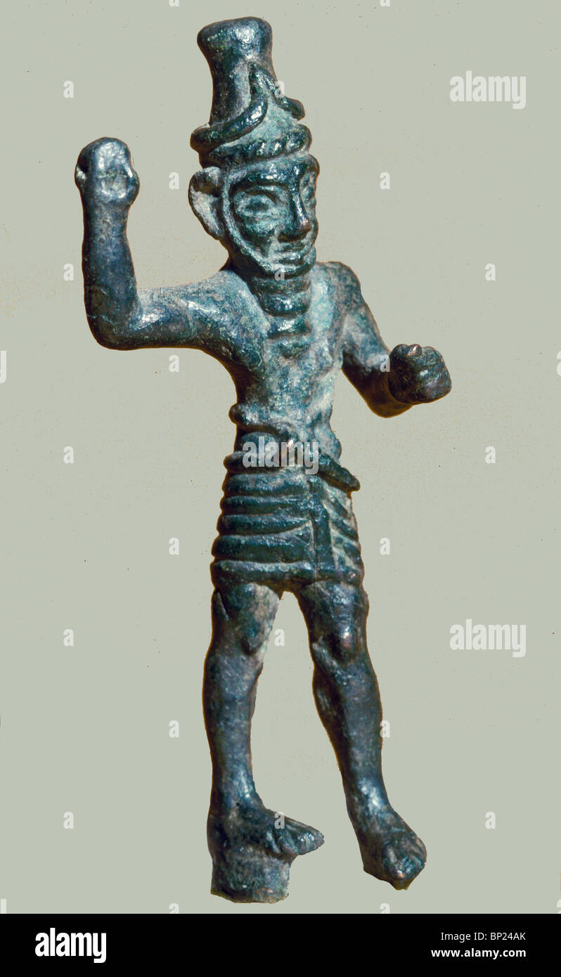 463. BRONZE FIGURINE OF RESHEF, THE PROTECTOR AGAINST EVIL EYE AND MALADIES, 13-14 C. BC. Stock Photo