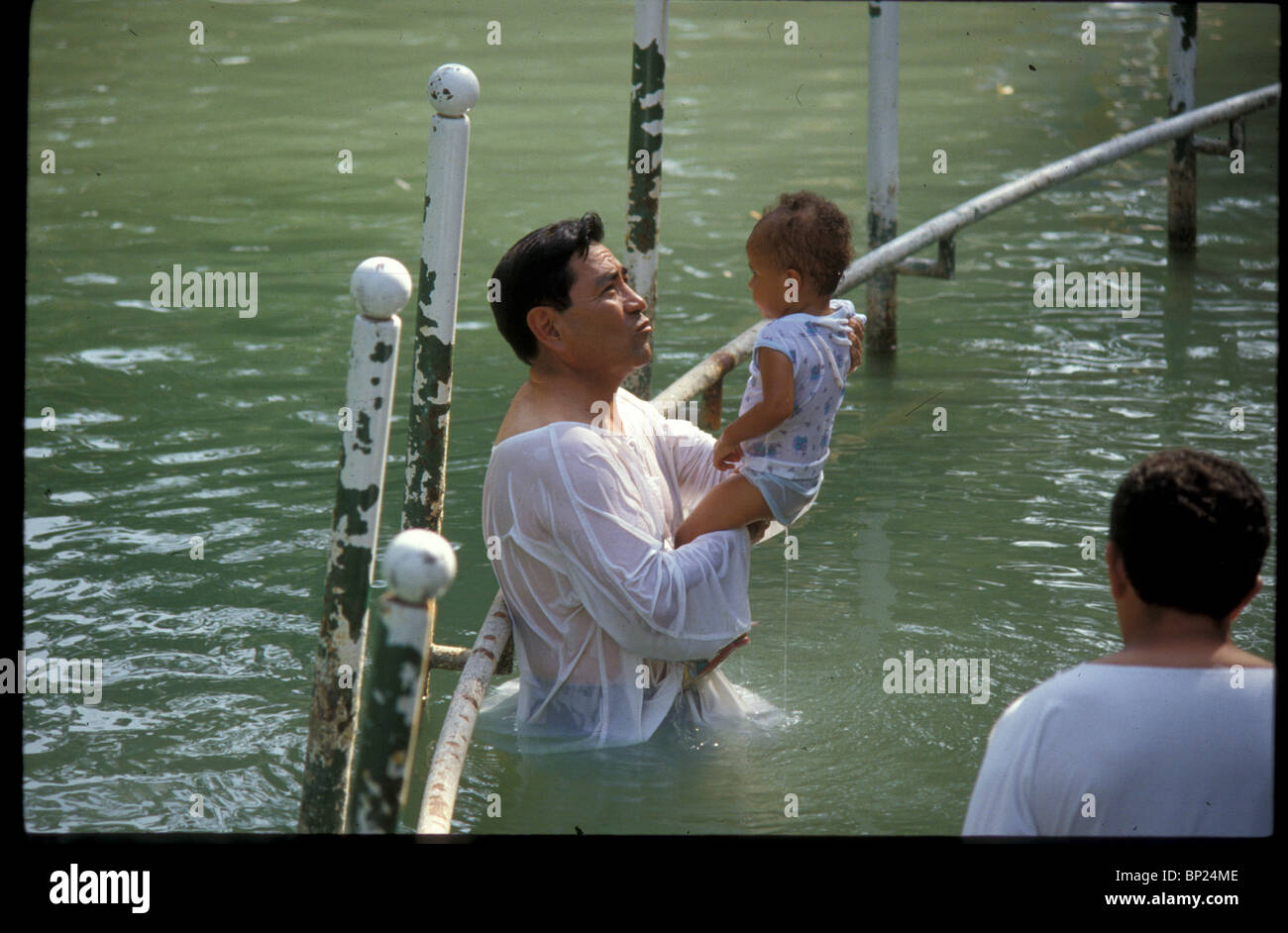 593. BAPTIZING CEREMONY IN THE RIVER JORDAN Stock Photo