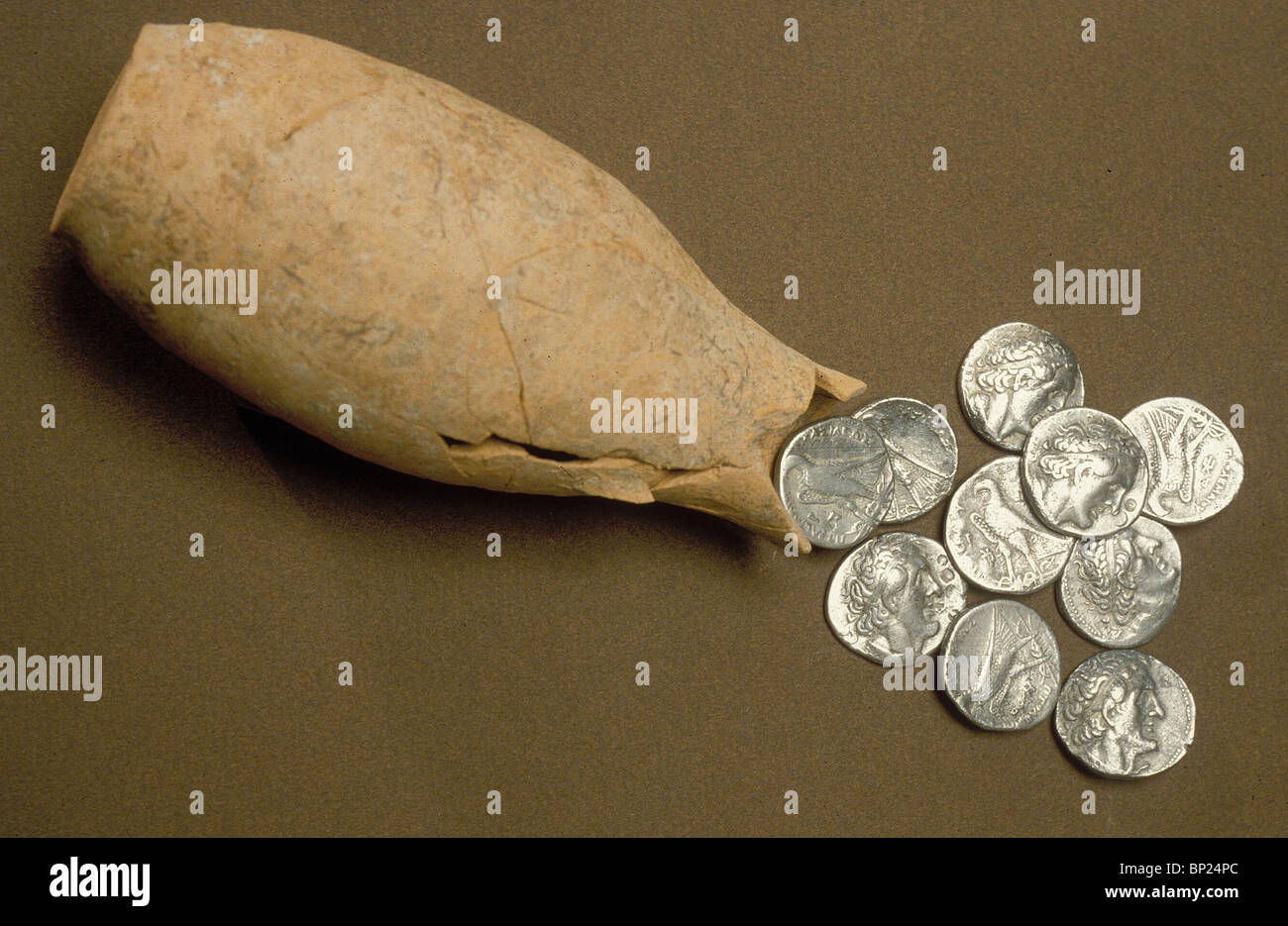 TREASURE OF PTOLEMY I. AND II. TETRA-DRACHMAS (CA. 3RD. C. BC.) WITH THE JUGLED IN WHICH THEY WERE FOUND AT THE DOR EXCAVATIONS Stock Photo