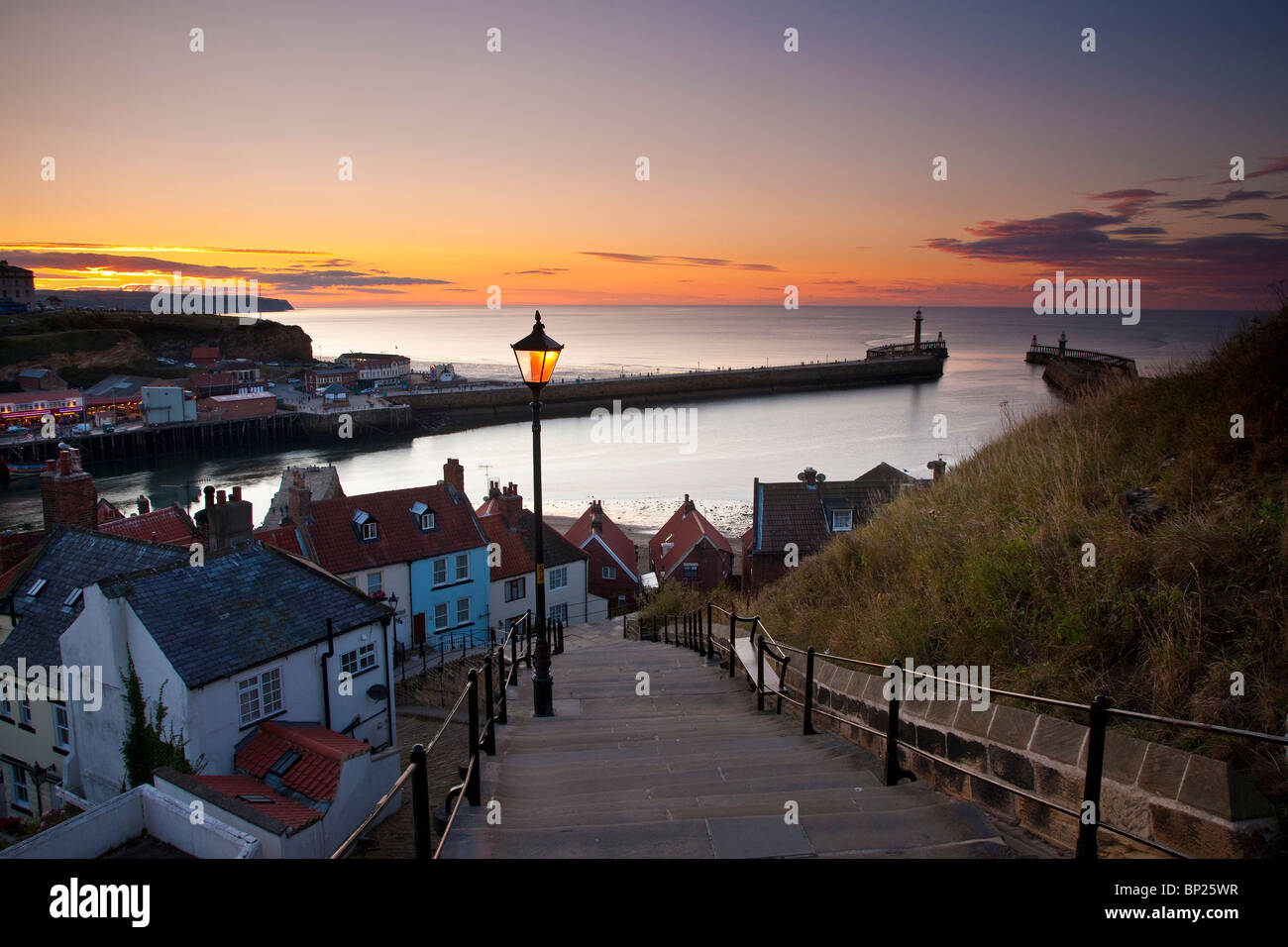 Summer Sunset from the 199 steps over Whitby Harbour, North Yorkshire Coast Stock Photo