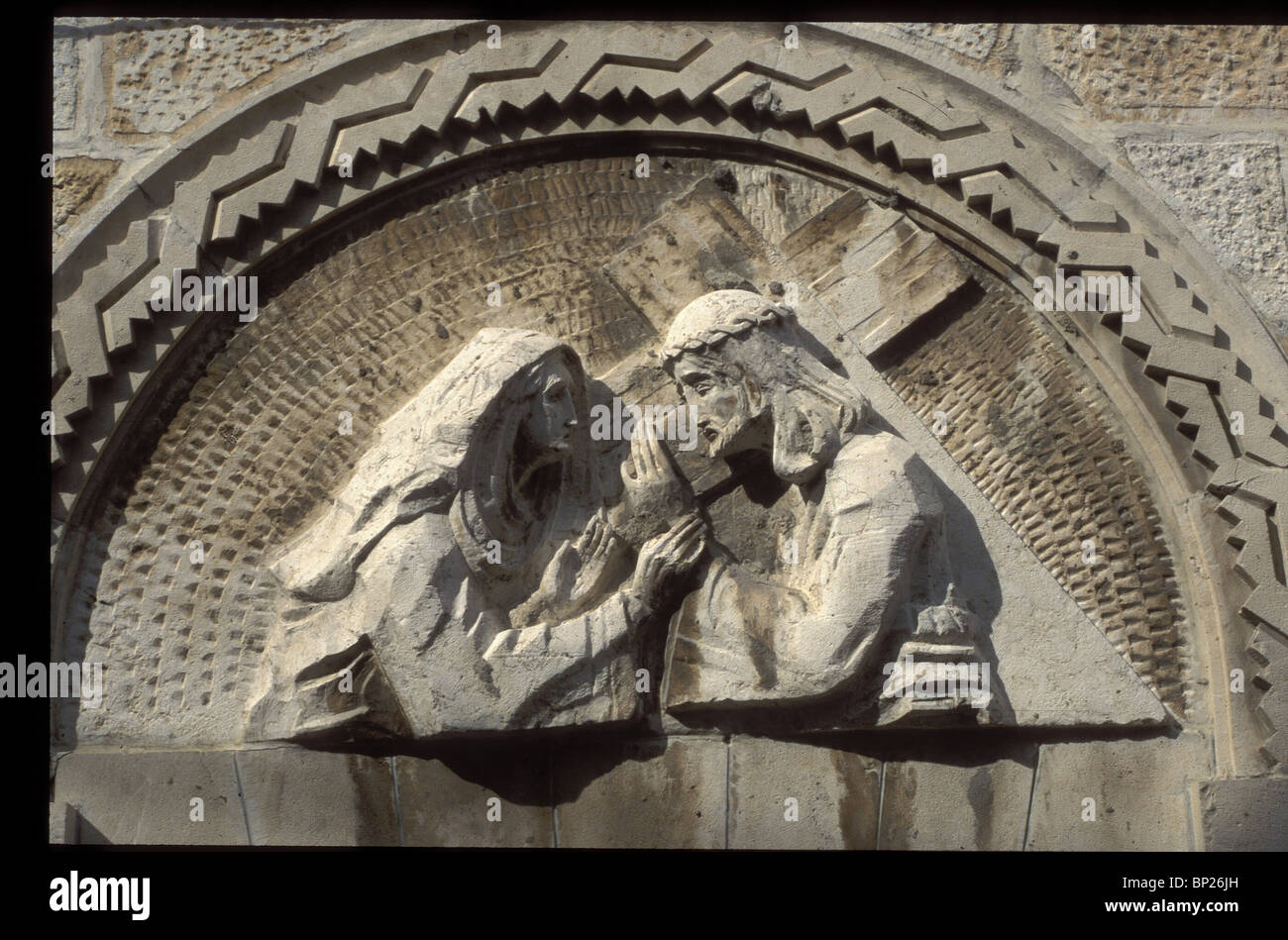 1126. VIA DOLOROSA, IV. STATION, WHERE JESUS MET HIS MOTHER (STONE CARVING BY THE POLISH ARTIST ZIELINSKY) Stock Photo