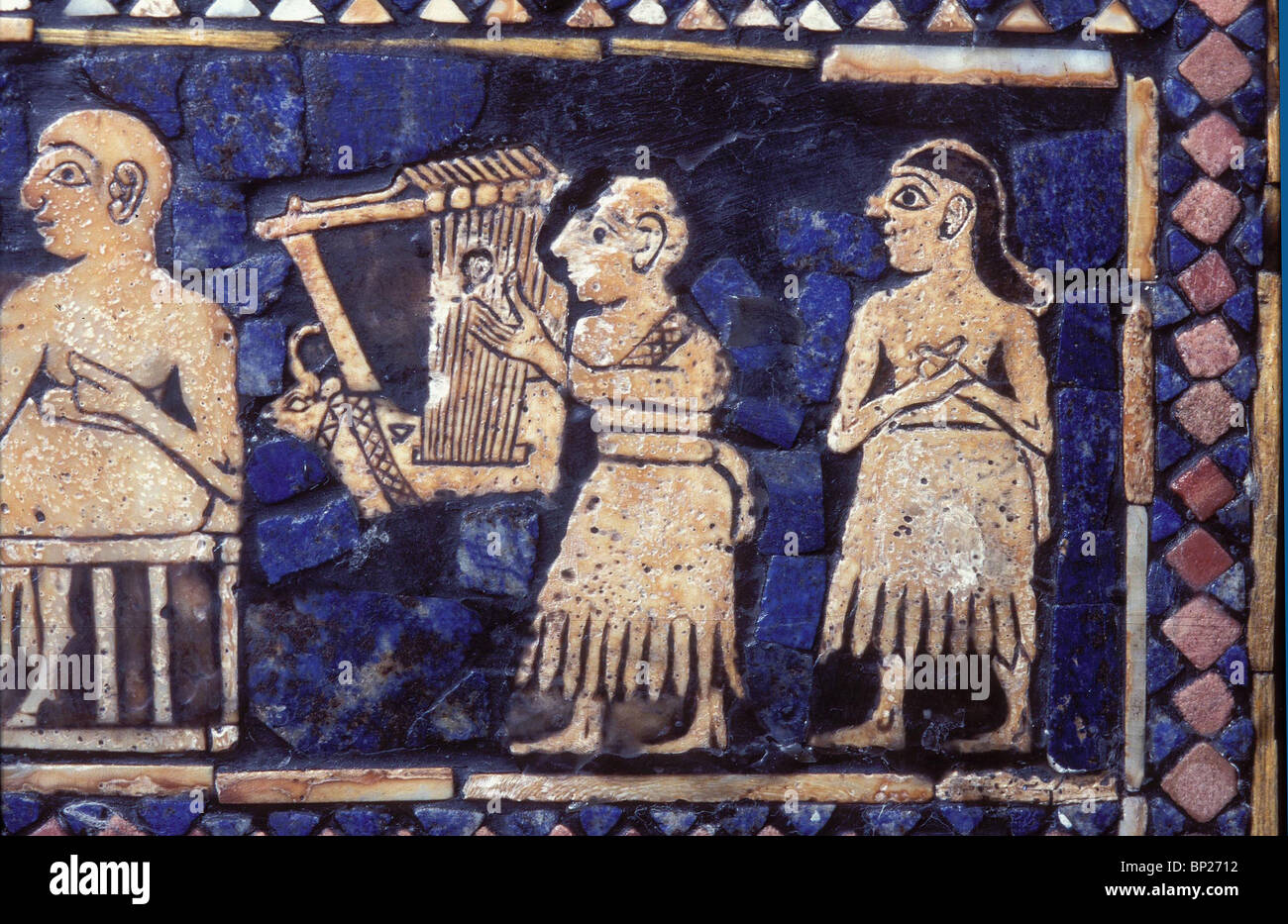 STANDART OF UR DATING FROM 2600 B.C. AN ELABORATELY DECORATED ART WORK INLAID WITH SHELL & LAPIS LAZULI DETAIL DEPICTING A LYRE Stock Photo