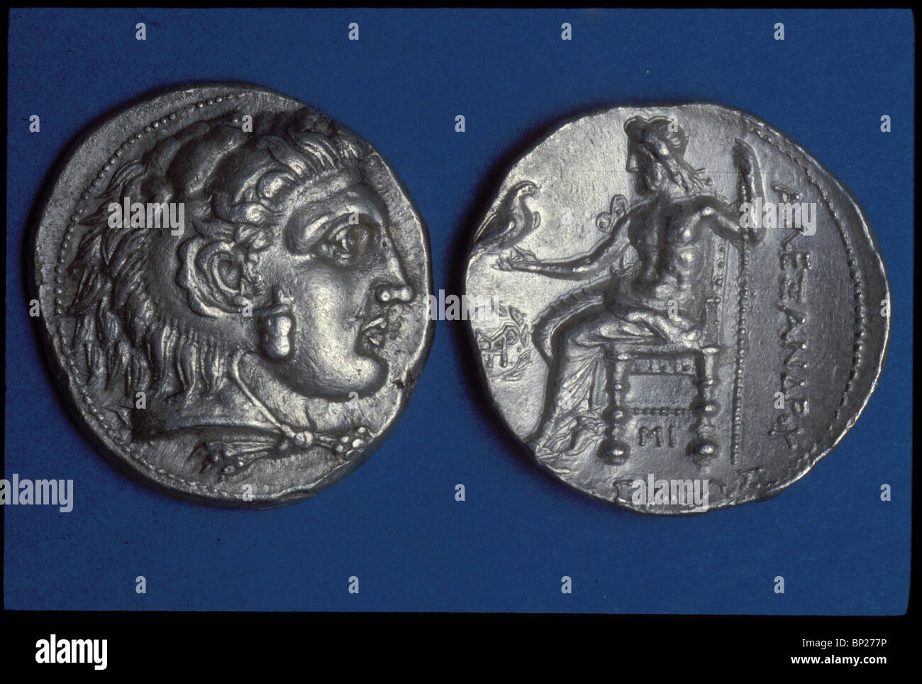 TYREAN SILVER DENAR WITH THE BUST OF ALEXANDER THE GREAT WITH A LION'S SKIN AS HEADDRESS obverse: ZEUS SEATED ON A THRONE Stock Photo