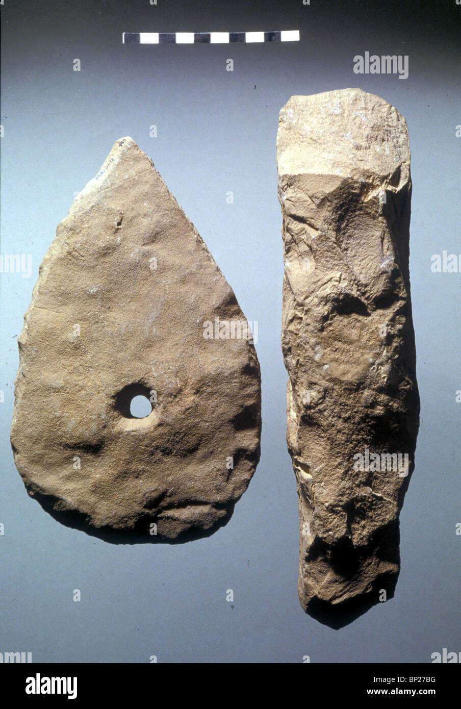 NEOLITHIC PERIOD C 8TH. MILLENNIUM BC AGRICULTURAL TOOLS; A STONE HOE (LEFT) & A STONE CHISELLED PLOW BLADE (LEFT) THE OVDAH Stock Photo