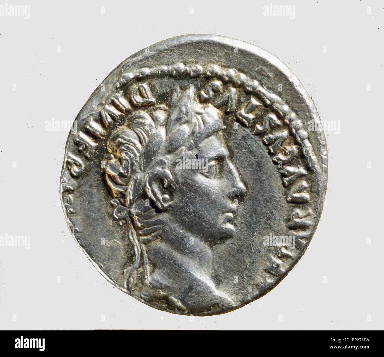 931. ROMAN COIN WITH THE BUST OF EMPEROR AUGUSTUS, (30 BC. - 14 AD.) Stock Photo