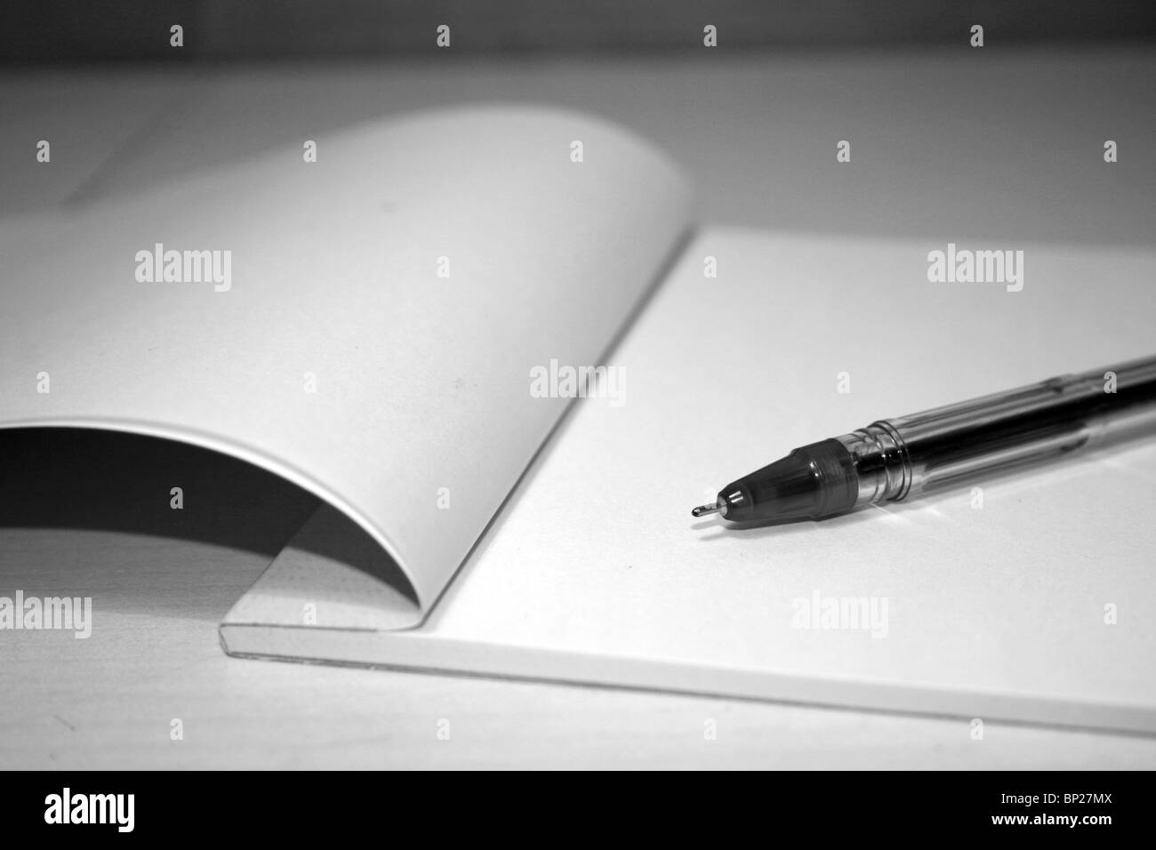 Pen on a blank notepad Stock Photo