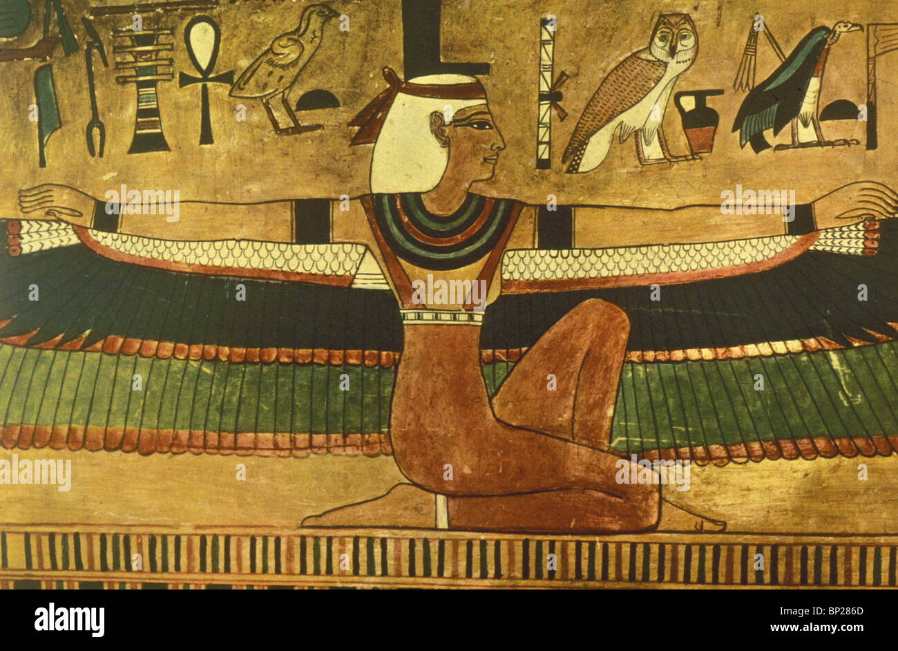 1881. GODDESS ISIS IS STRETCHING OUT HER WINGED ARMS IN A PROTECTIVE GESTURE. TOMB OF SETI I. XIX DYNASTY Stock Photo