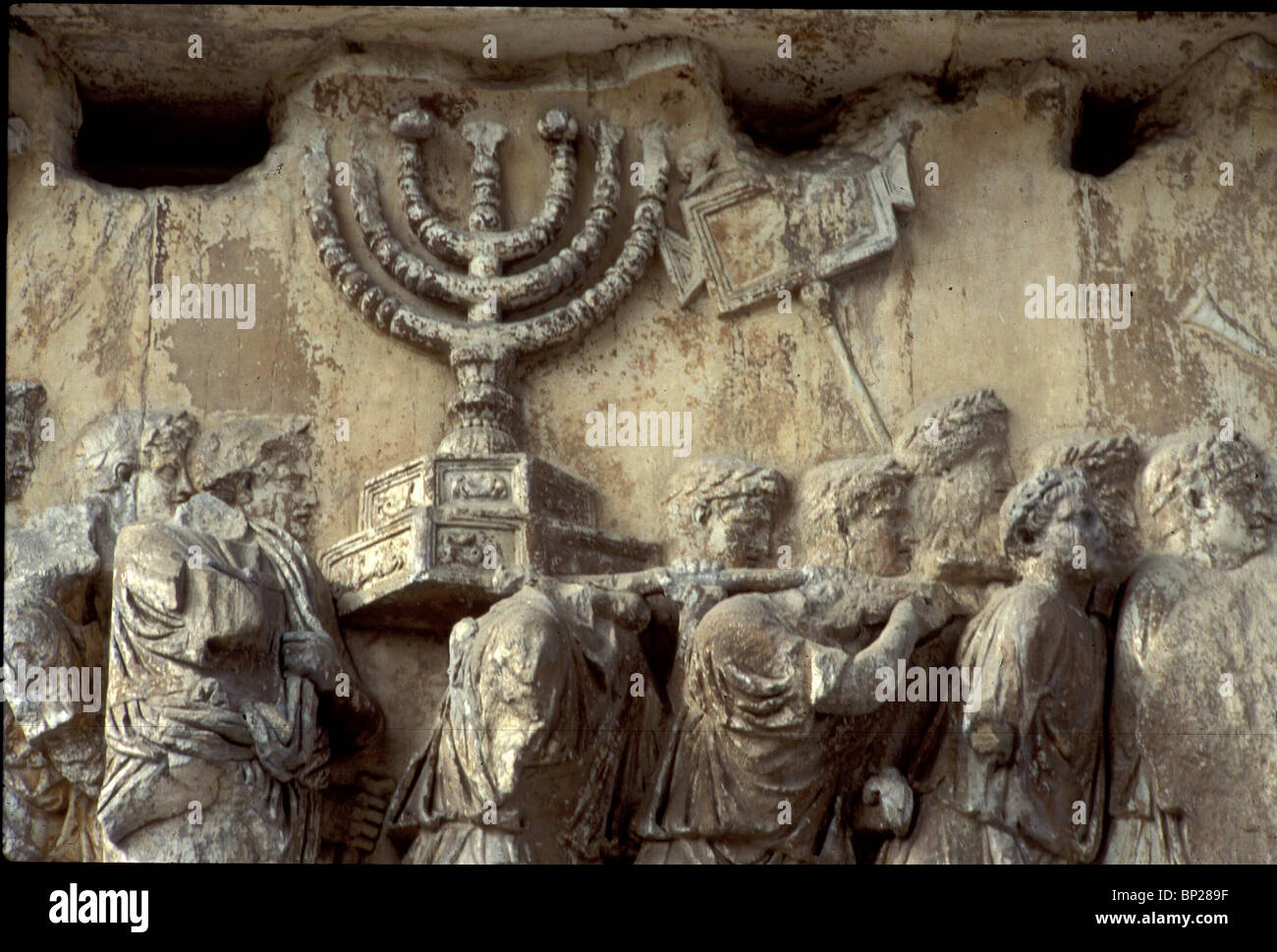 ARCH OF TITUS PANEL FROM THE ARCH DEPICTING ROMAN SOLDIERS IN TRIUMPHANT PROCESSION CARRYING THE GOLDEN MENORAH & OTHER Stock Photo