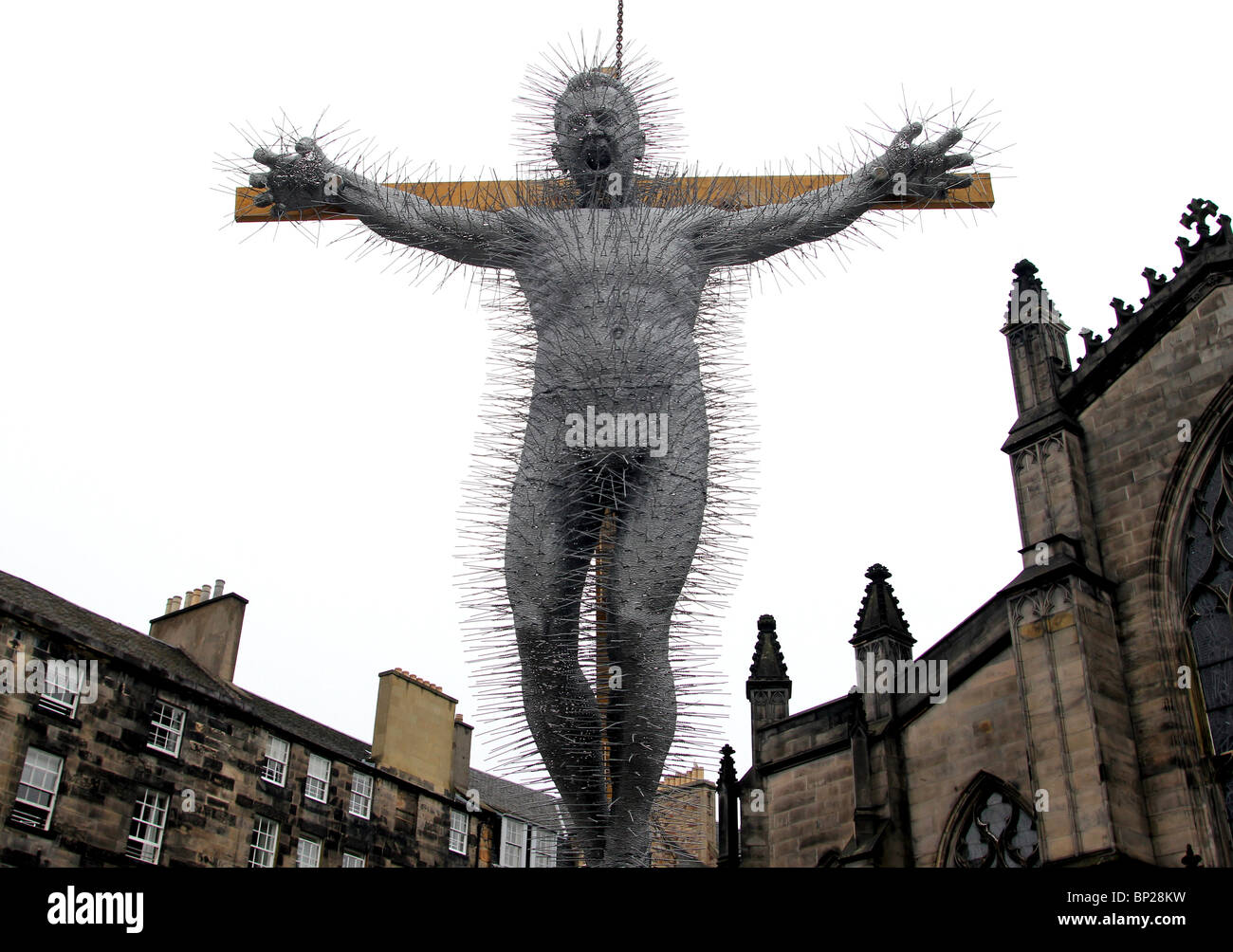 David Machs latest coat hanger sculpture hangs outside St Giles